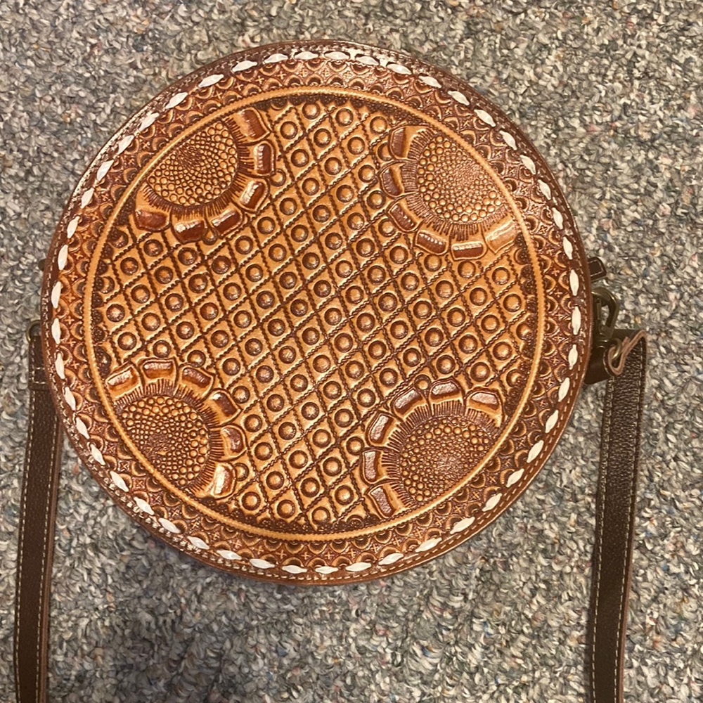 Round tooled leather canteen purse